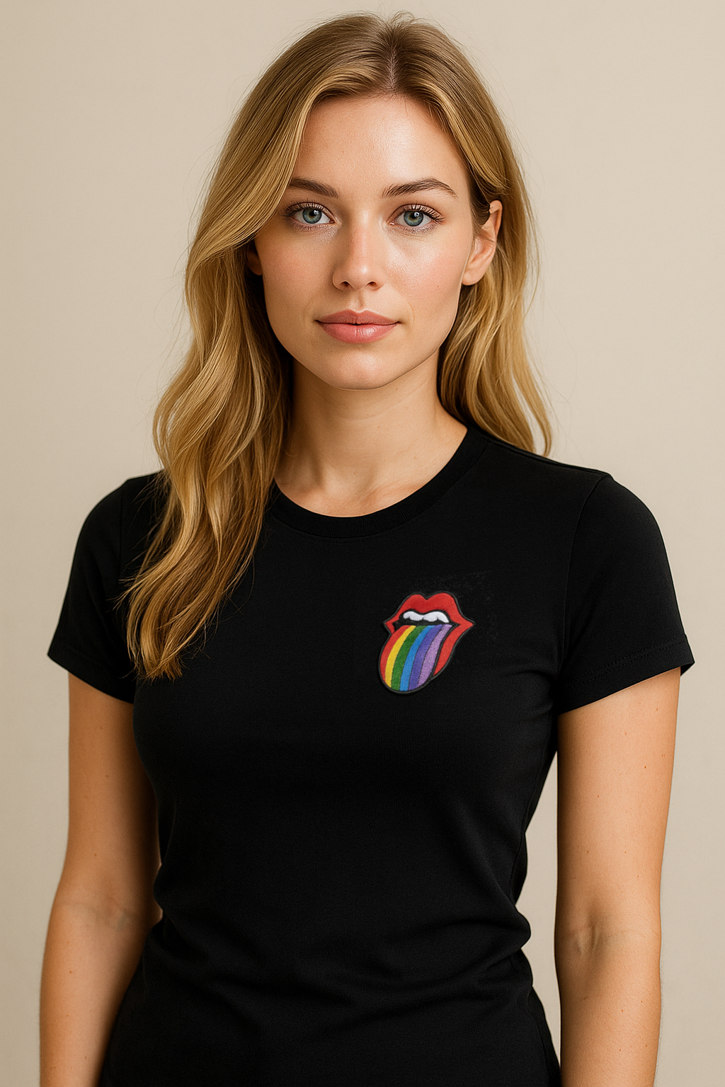 Lesbian woman wearing a black t-shirt with a Rainbow Rolling Stones style Embroidery on the heart